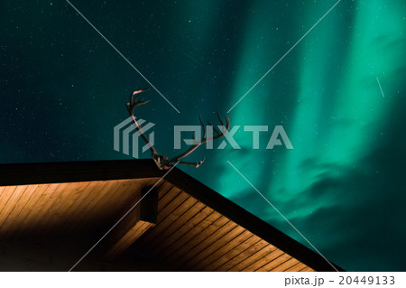 Aurora borealis above a cabin 20449133