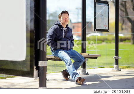 Middle age man on bus stop Middle age man on bus stop 20451083