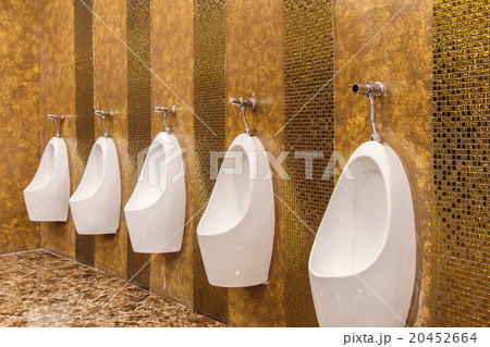 Urinals in an old building for men only. Urinals in an old building for men only. 20452664