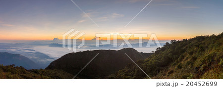 Layer of mountains and mist at sunset time Layer of mountains and mist at sunset time 20452699