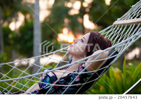 woman relaxing in a hammock woman relaxing in a hammock 20457643