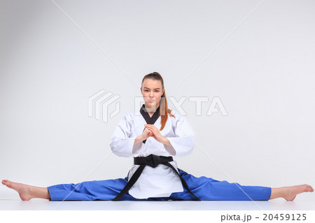 The karate girl with black belt  20459125