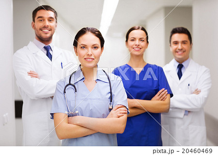 happy group of medics or doctors at hospital 20460469