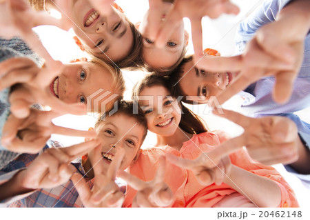 happy children showing peace hand sign happy children showing peace hand sign 20462148