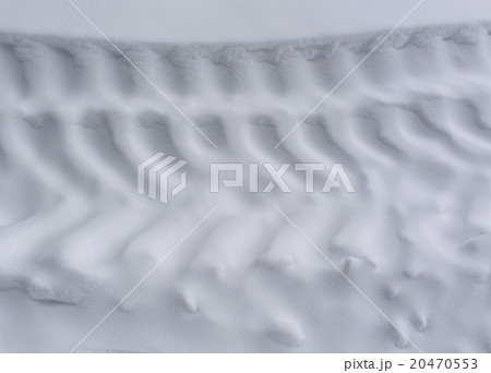Tire tracks on snow. 20470553