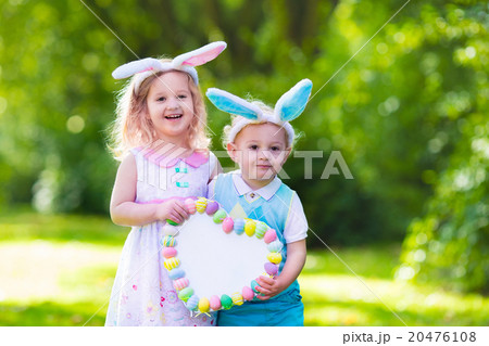Kids having fun on Easter egg hunt 20476108