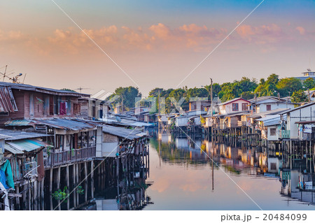 slum at waterside in sunrise morning slum at waterside in sunrise morning 20484099