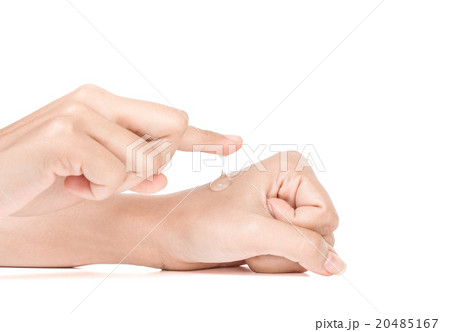 hand in action apply cream to skin 20485167