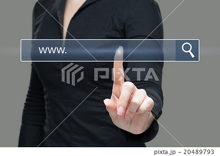 Young woman touching web browser address bar with Young woman touching web browser address bar with 20489793