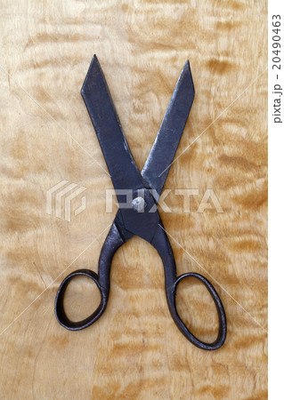 Vintage scissors on the wooden background Vintage scissors on the wooden background 20490463
