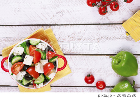Greek salad in red boul Greek salad in red boul 20492530