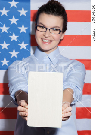 Attractive young American businesswoman is 20494050