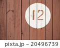 Number 12 on a wooden surface 20496739