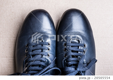Blue boots on the ground. Blue boots on the ground. 20505554