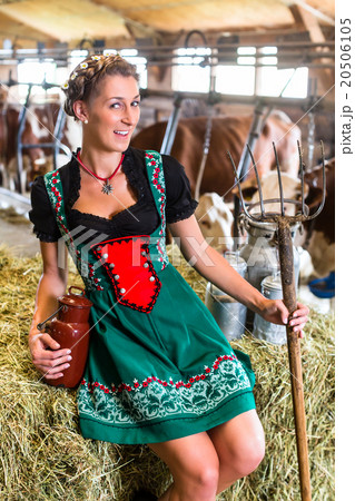 Sexy Countrywoman in cowhouse 20506105
