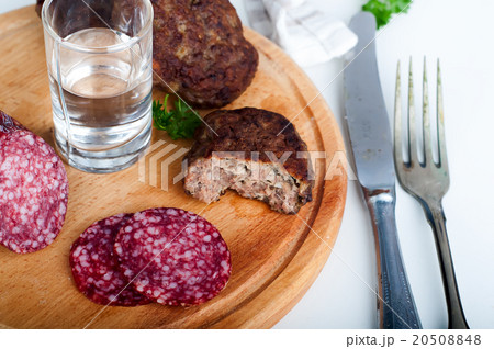 Glasses vodka and board with sausage Glasses vodka and board with sausage 20508848