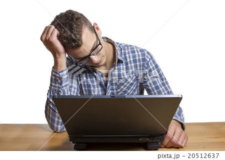 Desperate Man sitting at the Computer 20512637