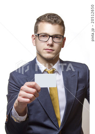Young businessman presenting his Bussiness card Young businessman presenting his Bussiness card 20512650