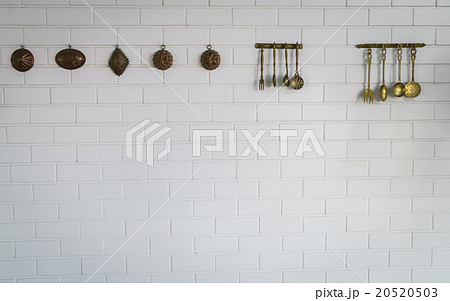 kitchen spoon and fork hanging on wall kitchen spoon and fork hanging on wall 20520503