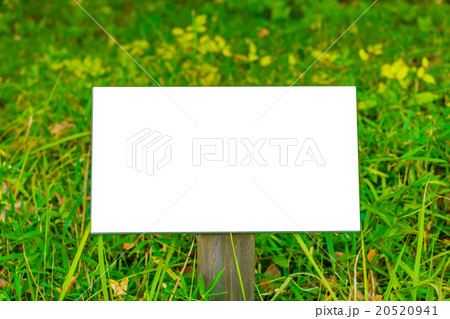 Wood sign on grass 20520941
