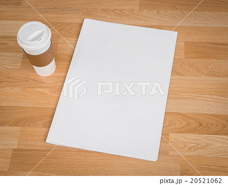 Blank Newspaper with empty space and coffee cup mock up on wood Blank Newspaper with empty space and coffee cup mock up on wood 20521062