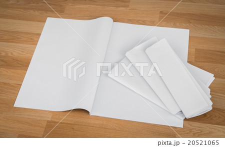 Blank Newspaper with empty space mock up on wood background Blank Newspaper with empty space mock up on wood background 20521065