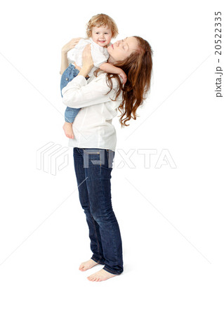 Mom kisses baby 20522335