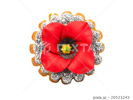 cupcake sprinkled with poppy seeds with a flower 20523245