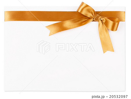 Gold bow on a satin ribbon on a white background Gold bow on a satin ribbon on a white background 20532097
