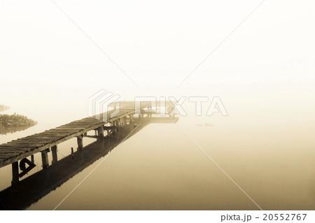 old jetty walkway pier at the lake in morning old jetty walkway pier at the lake in morning 20552767