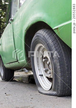 Flat tire of old car Flat tire of old car 20552883