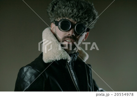 winter portrait of a man in goggles winter portrait of a man in goggles 20554978