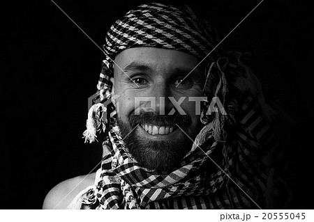 portrait of a bearded man wearing a hijab portrait of a bearded man wearing a hijab 20555045