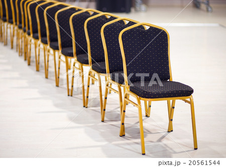 Row of chairs in a boardroom Row of chairs in a boardroom 20561544