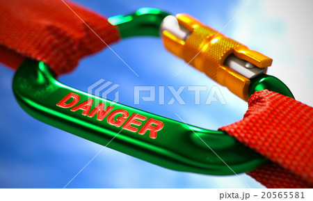 Danger on Green Carabiner between Red Ropes. Danger on Green Carabiner between Red Ropes. 20565581