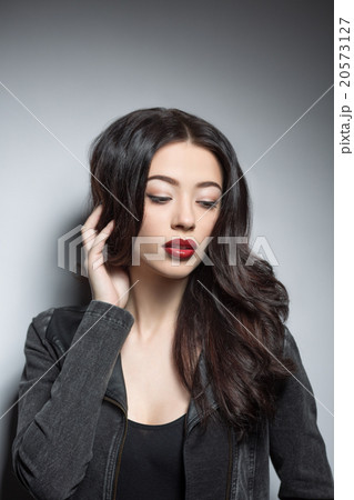 Fashion model woman with dark red lips in studio Fashion model woman with dark red lips in studio 20573127