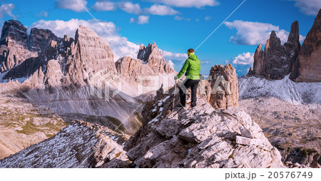 Hiker enjoying view from top of mountain 20576749