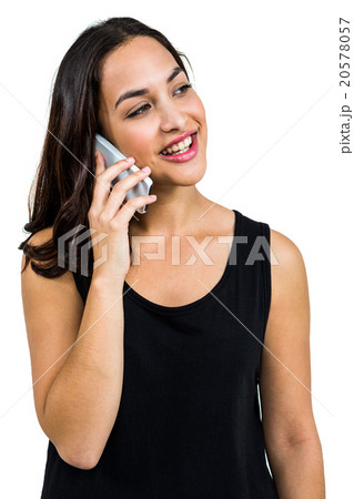 Happy beautiful woman talking on phone Happy beautiful woman talking on phone 20578057