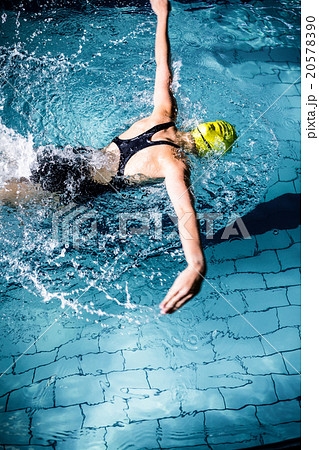 Swimmer woman swimming in the swimming pool 20578390