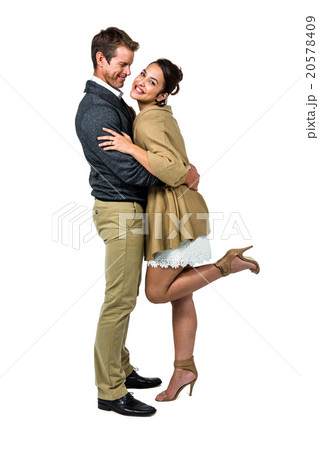 Full length of romantic couple hugging Full length of romantic couple hugging 20578409