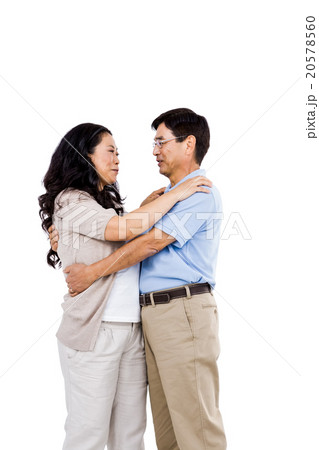 Smiling couple holding each other 20578560