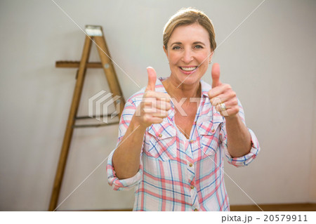 Woman with thumbs up Woman with thumbs up 20579911