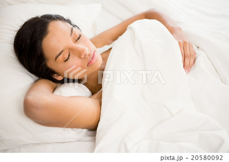 Sleeping brunette in bed Sleeping brunette in bed 20580092
