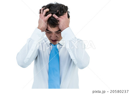 Irritated asian businessman holding his head Irritated asian businessman holding his head 20580237