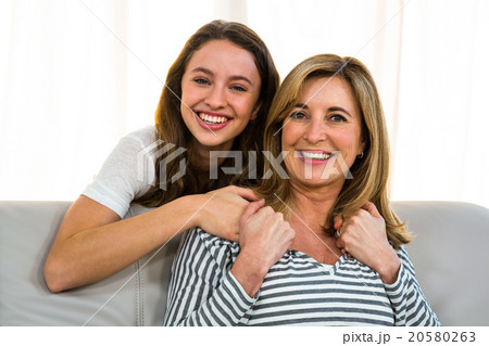 Mother and daughter smiling Mother and daughter smiling 20580263