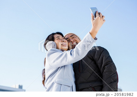 Cute couple taking selfie Cute couple taking selfie 20581982