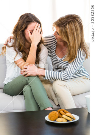 Mother comfort her daughter 20582256