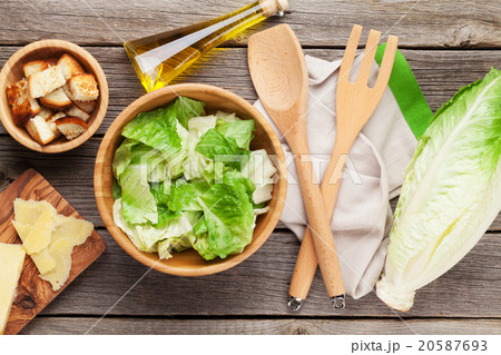 Fresh healthy caesar salad cooking 20587693