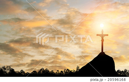 Silhouette Jesus and the cross over sunset 20596168