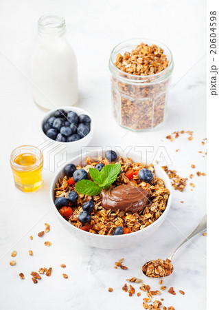 Fresh granola with chocolate hazelnut spread 20604598